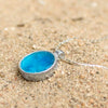Rund blå sølvhalskæde med et helt stykke romersk glas